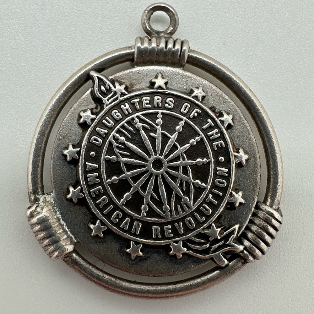Metal DAR disc silver tone charm